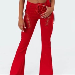 Size M red flare lace up jeans.